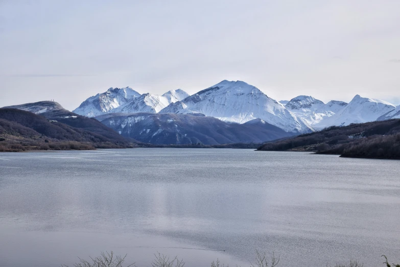 an image of the mountains that were covered in snow