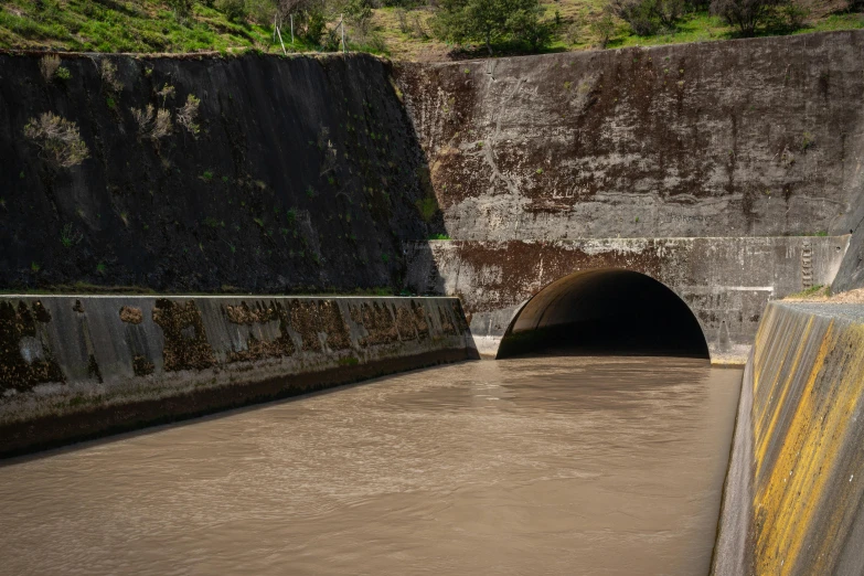 a large bridge with a tunnel in the middle