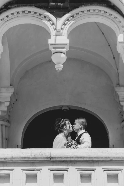 a black and white po of two brides