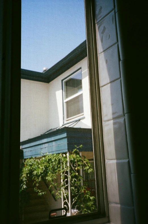 view out a window on a small building