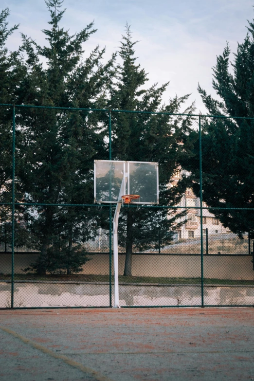 the backboard on the basketball court is up