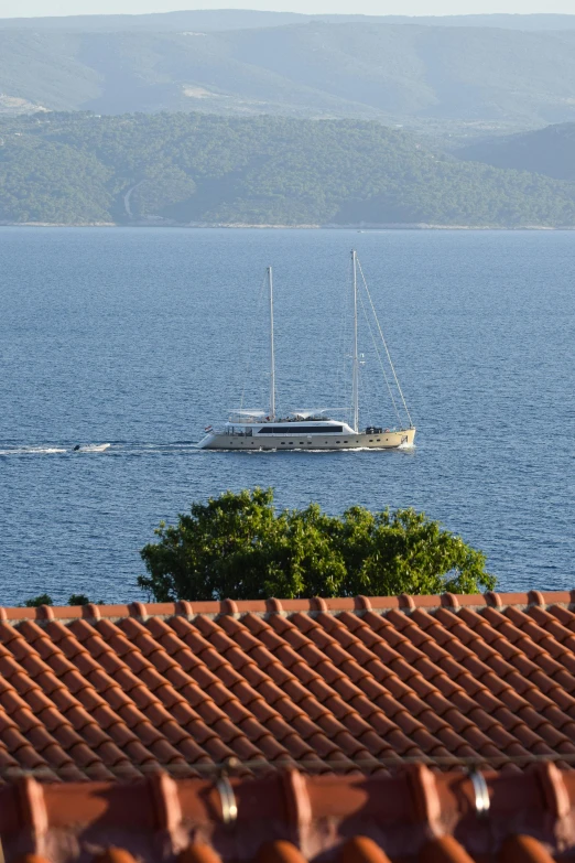 a white ship out on the water