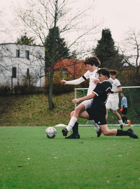 soccer players in action on the field