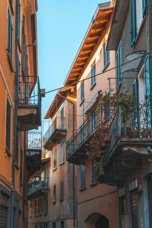 a building with stairs and balconies next to it