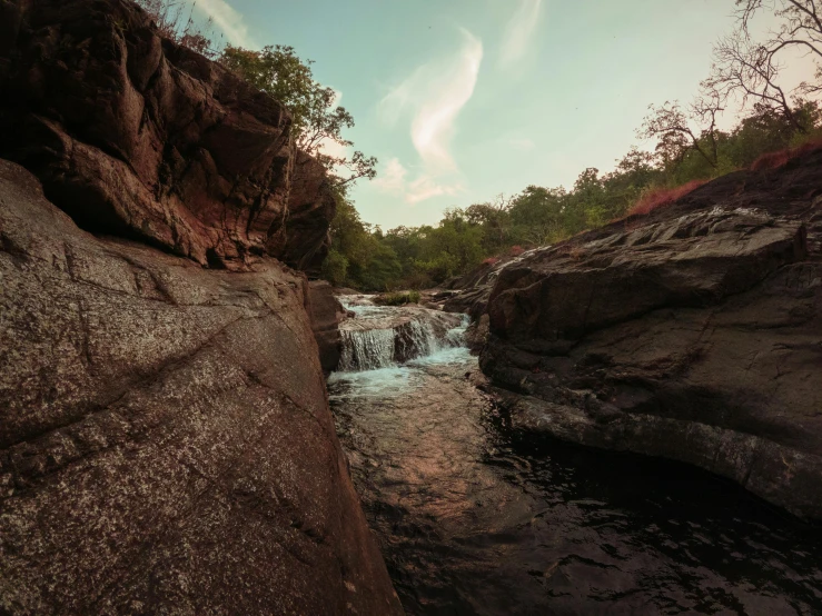 a river that has some rocks on it