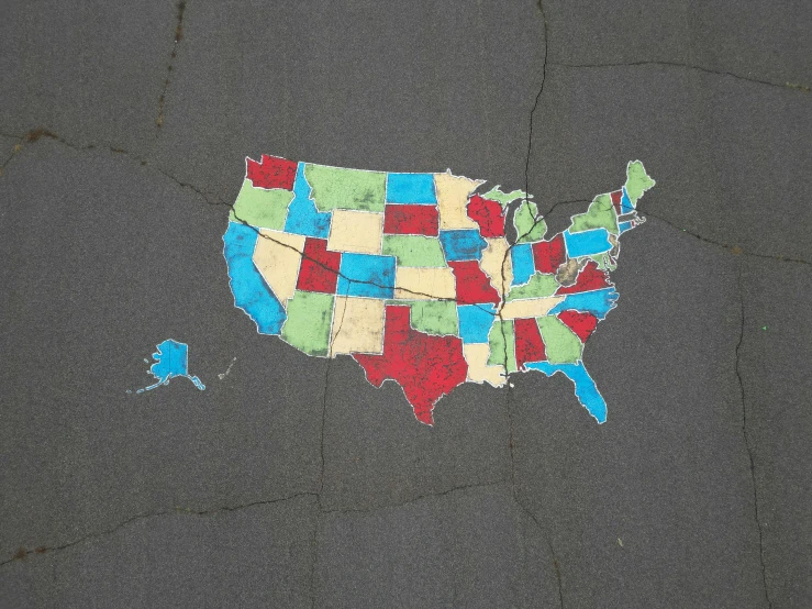 a map painted on the road that shows the states