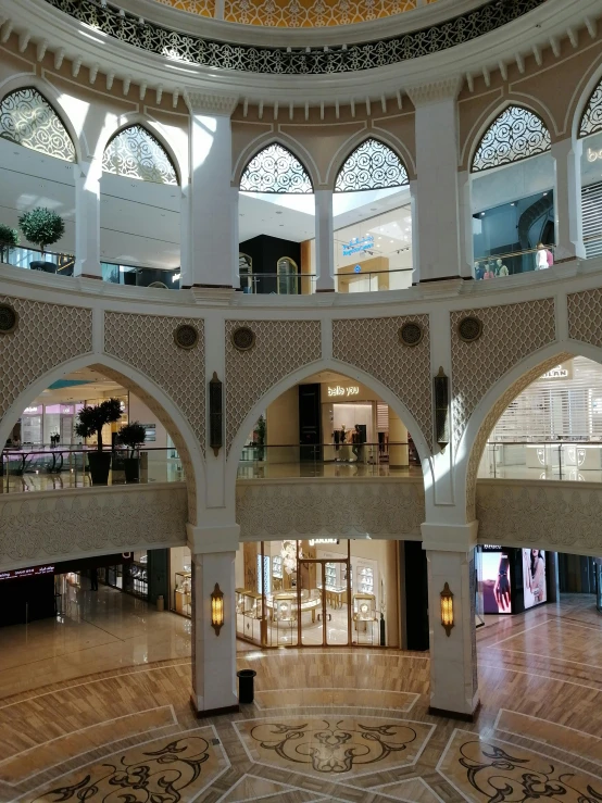 a huge mall filled with lots of arches and windows