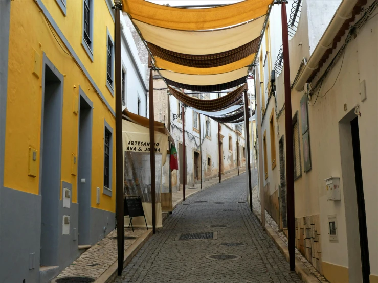 a very long narrow city street lined with buildings