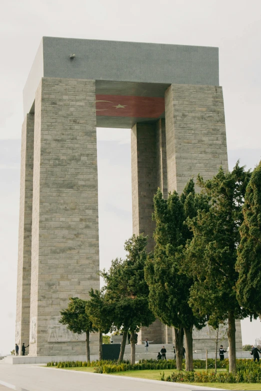 a large building with an unusual shaped doorway on it