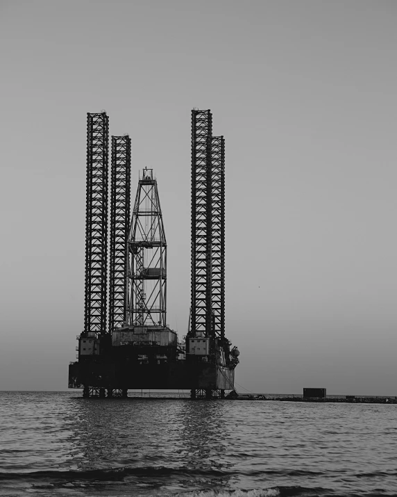 a big crane sitting on the top of a big ship