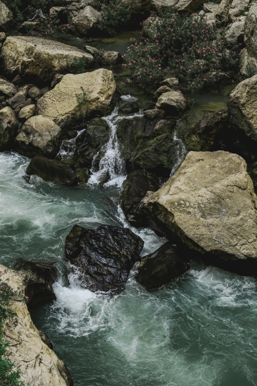 a stream of water passing through some rocks