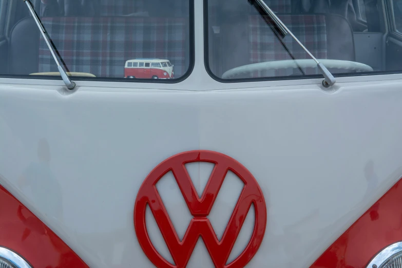 a vw bus with the logo of a german vw camper van on the front