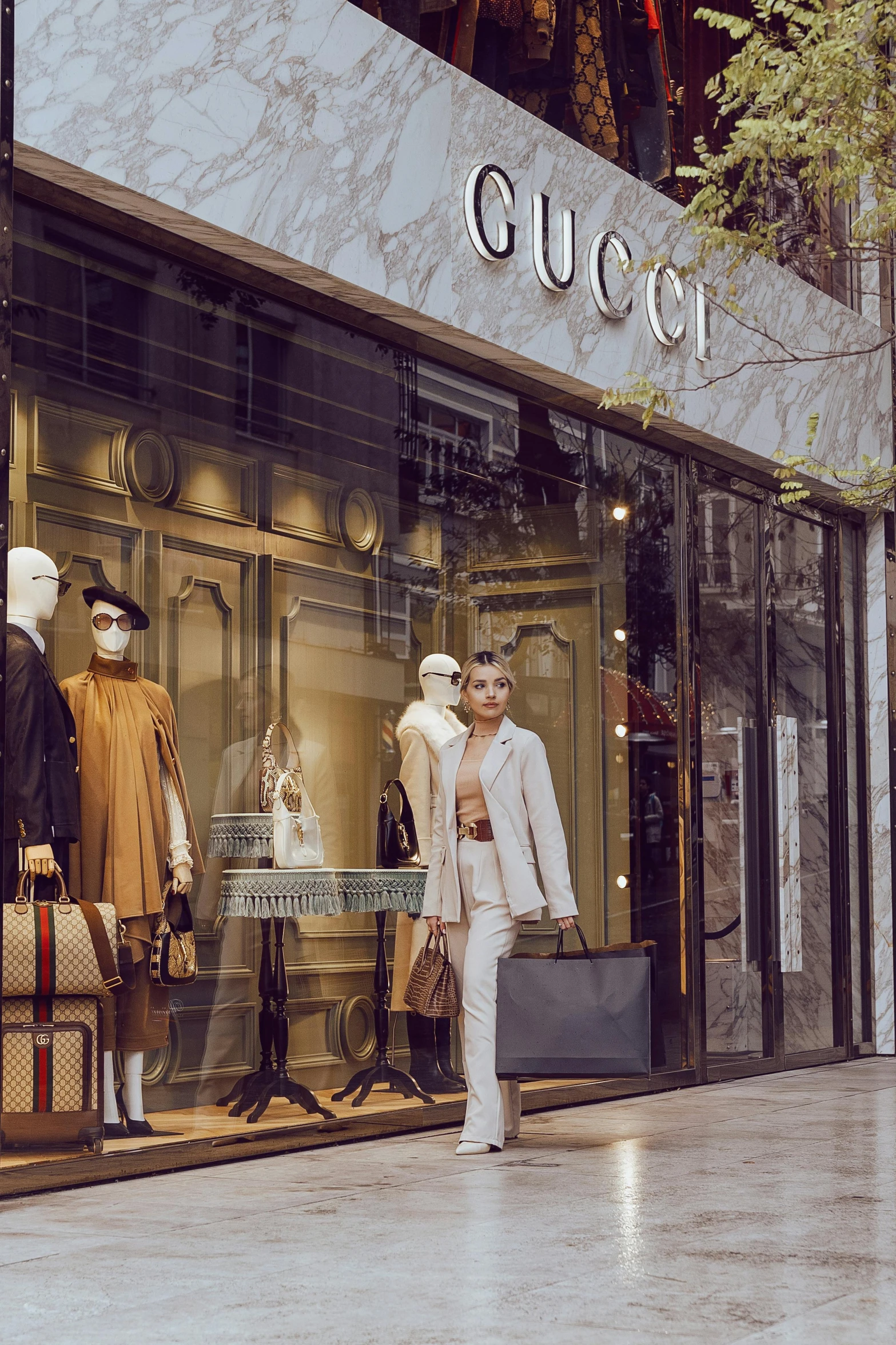 a person walking past the front of a shop