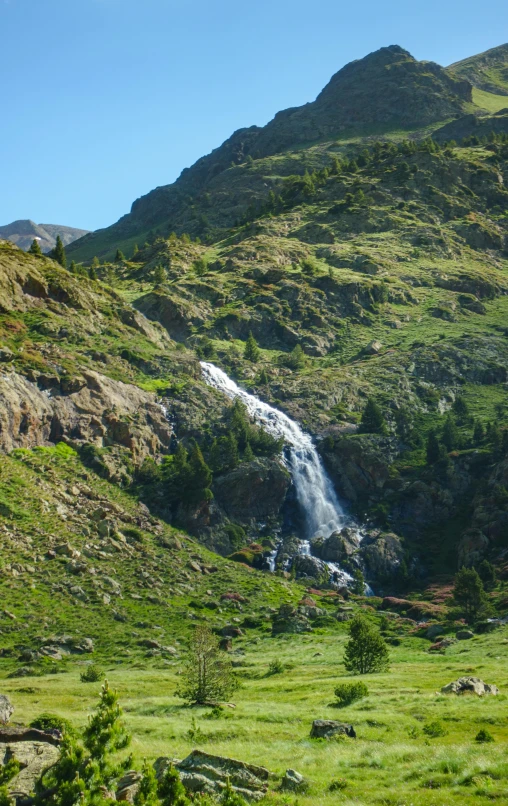 an image of a mountain that is on top of a hill