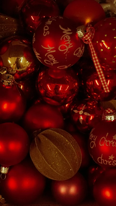 a pile of christmas ornaments on top of each other