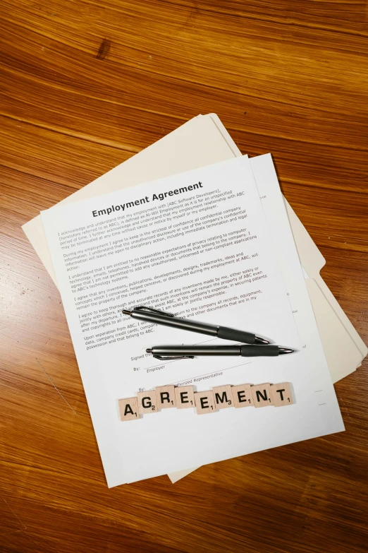 a pile of papers sitting on top of a table