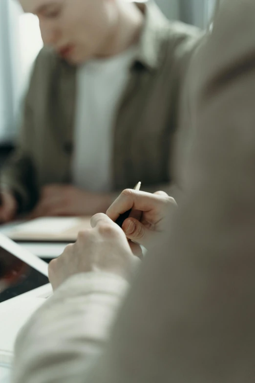 a close - up of people using a digital device