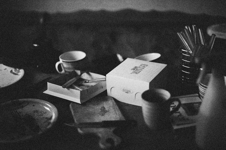 an image of a table setting with coffee cups