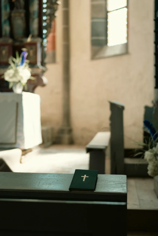 the alter in a church is set up with a cross