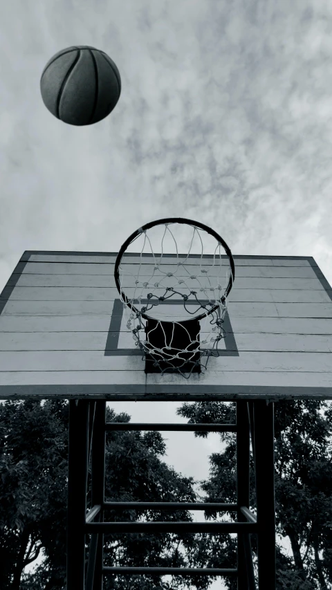 a basketball is dunked in to the hoop