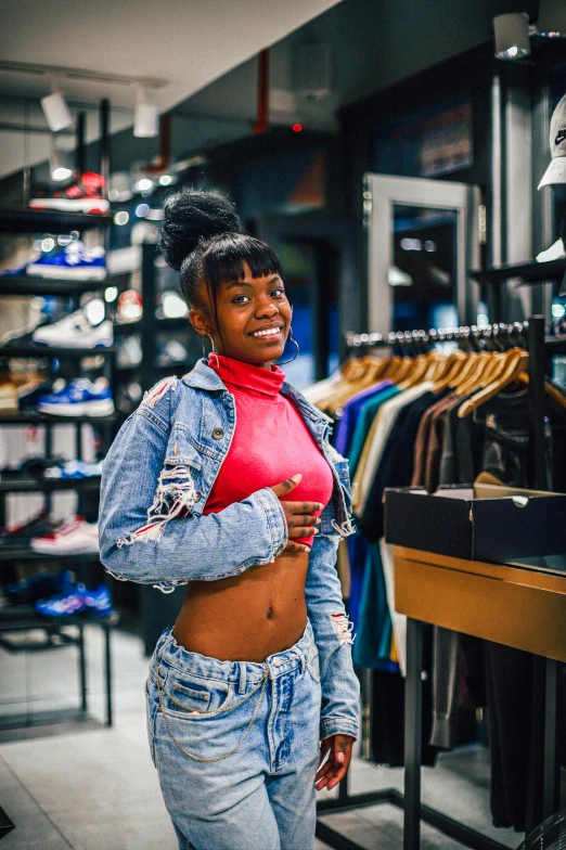 a young woman looking back in the store