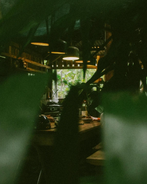 blurred picture of an outdoor kitchen with an outdoor hanging lights