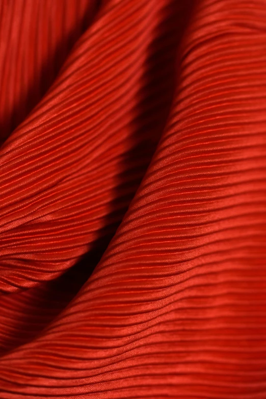 red wavy rippled fabric texture that is perfect for background or backdrop