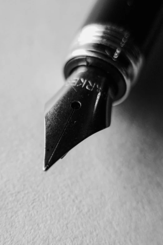 black and white pograph of a fountain pen