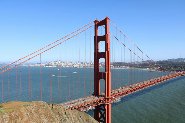 an aerial view of the golden gate bridge and the city