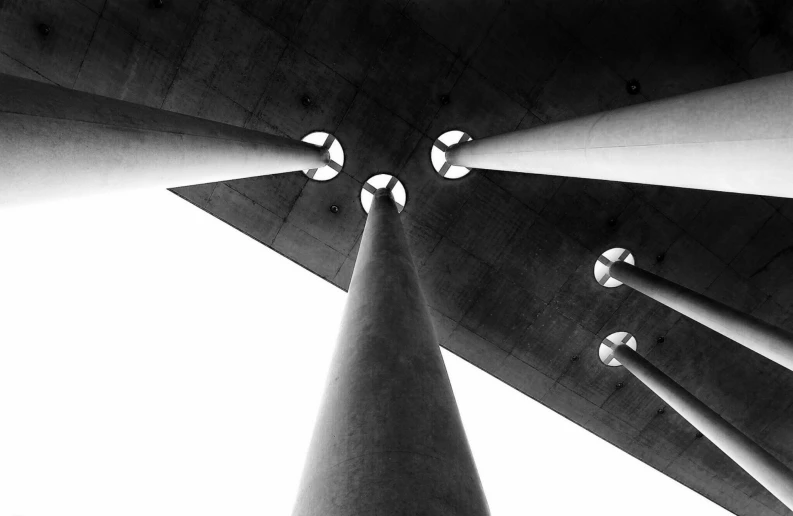 the underside of a column with several light spots on the top