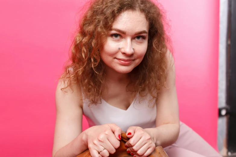 a close up of a person holding a shoe