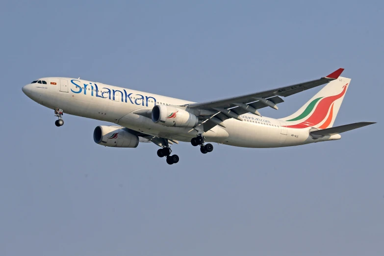 a large passenger jet flying through the sky