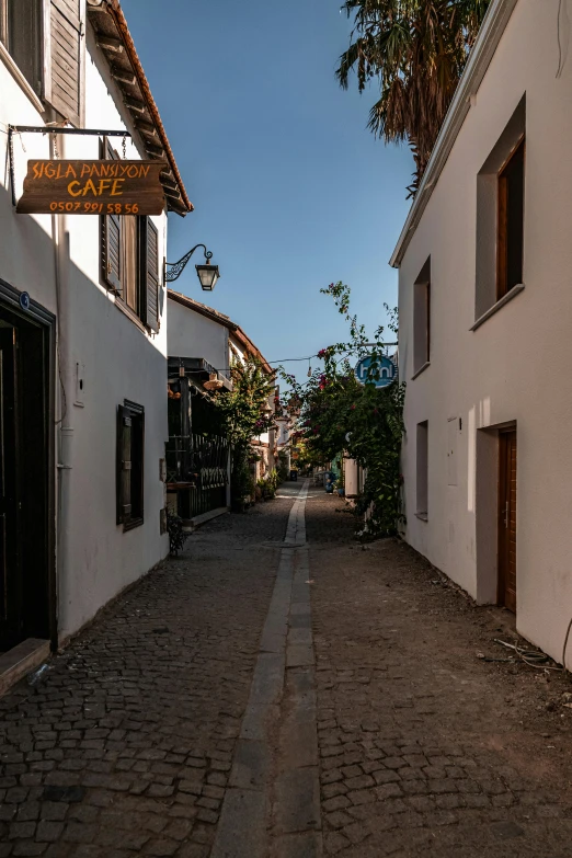 a narrow alley in the center of a city