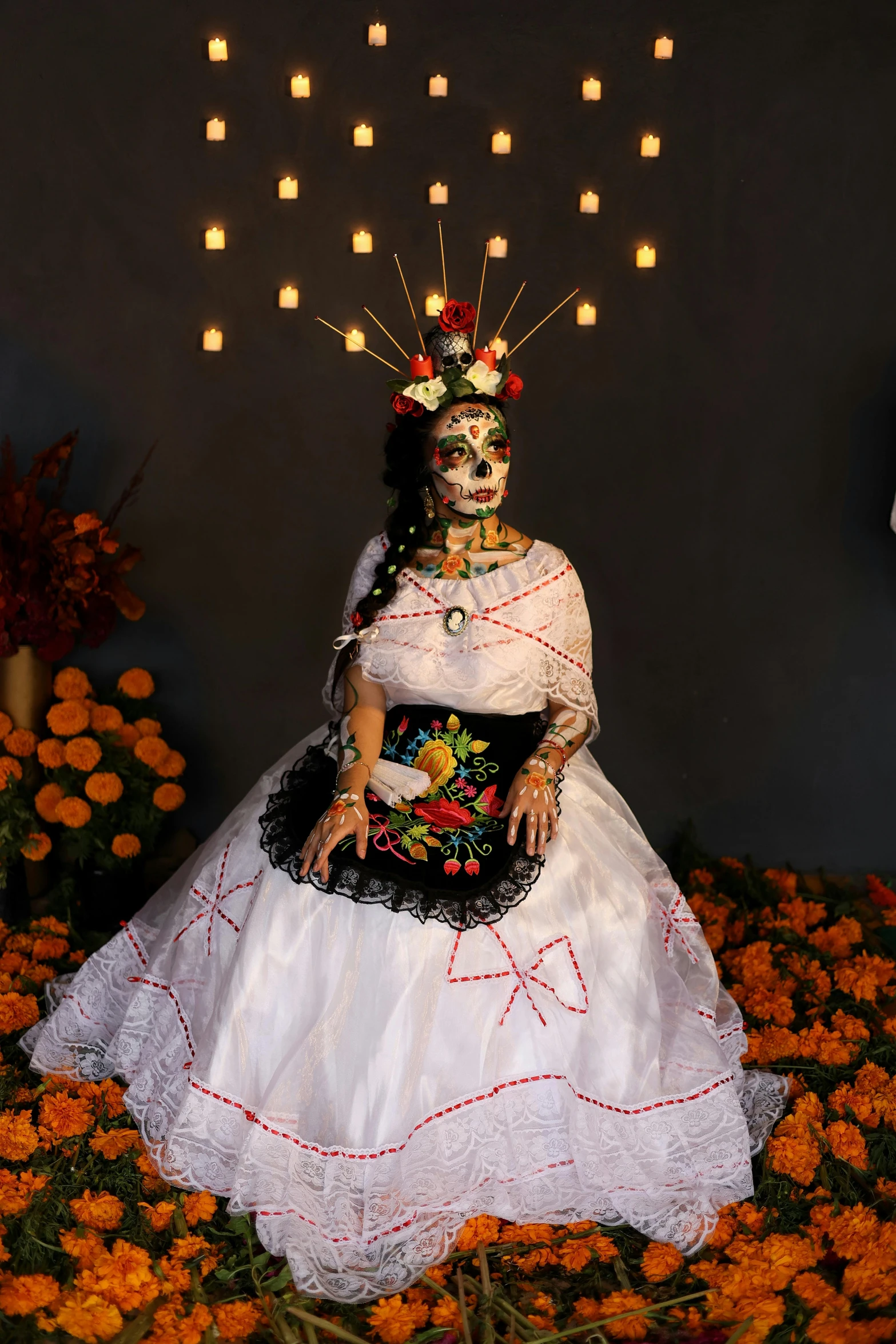 a woman dressed up in a mexican dress