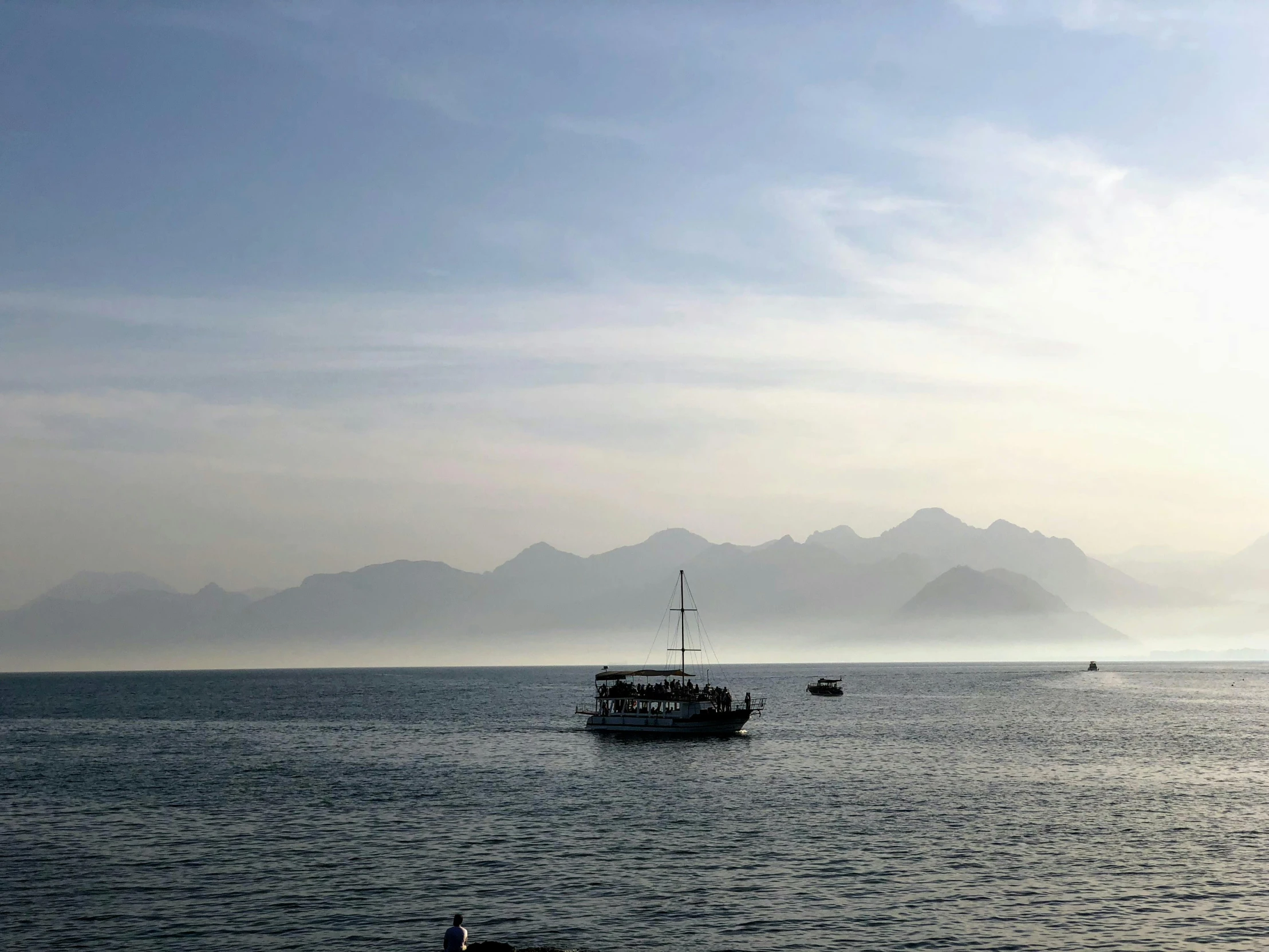 a sailboat is sitting in the water