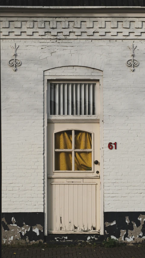 a door that is open next to a building