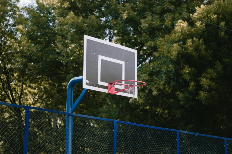 a basketball hoop is hanging above a basketball net
