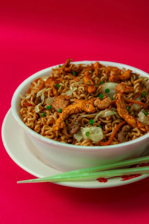 a bowl with food inside of it on a plate