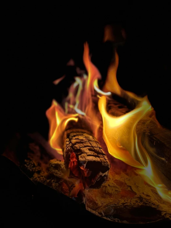 a campfire with lots of fire inside of it