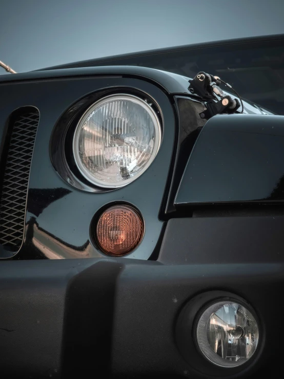 a closeup po of the front end of a sports car