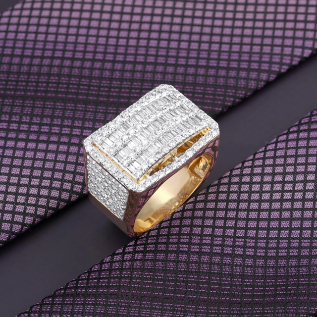 a diamond ring on top of a tie