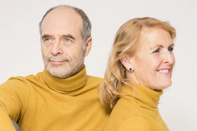 a man and a woman posing for a picture