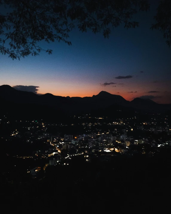 the city skyline at night in a twilight