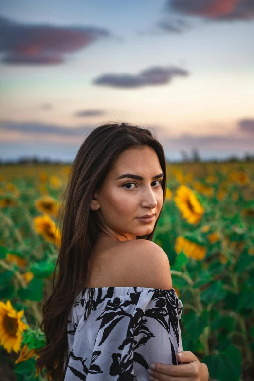 an image of a woman in the middle of a field