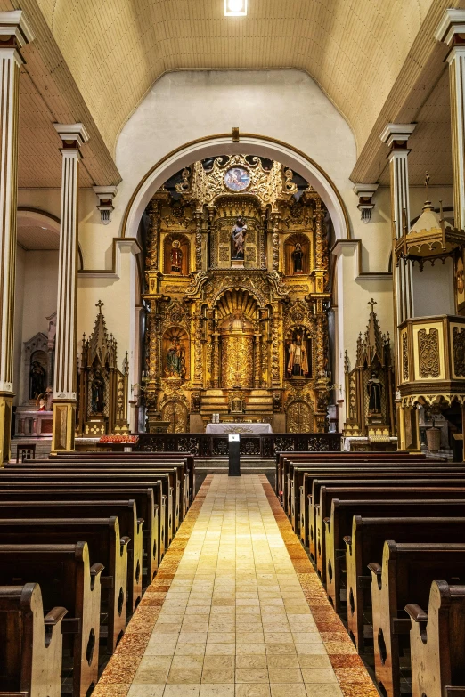 an interior of a large cathedral with white columns