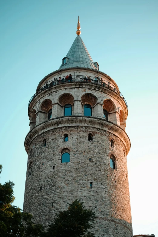 the tall building is very tall and has a domed roof