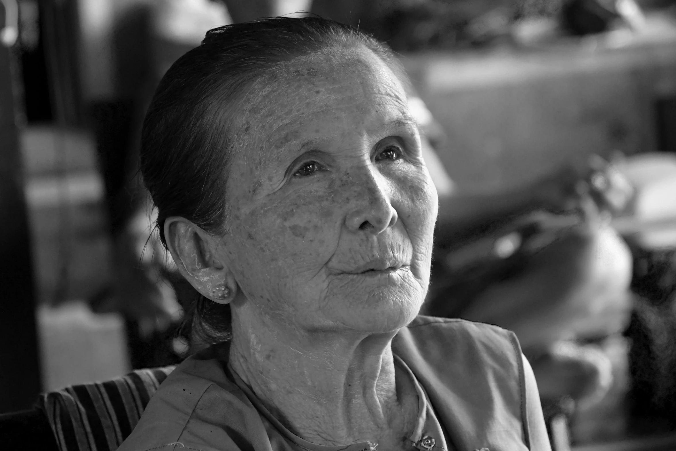 a black and white po of a woman smiling