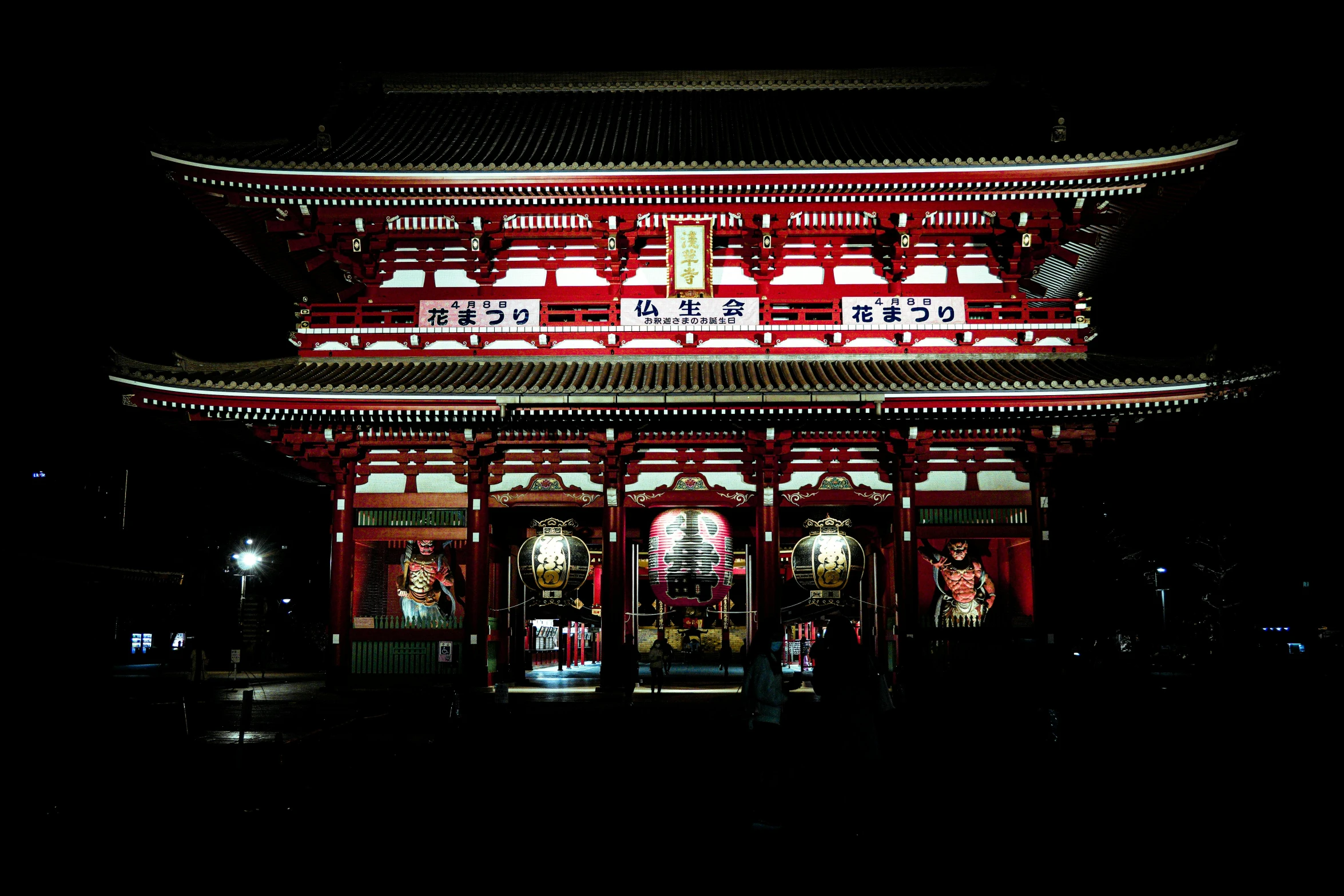 a tall building with lots of red columns