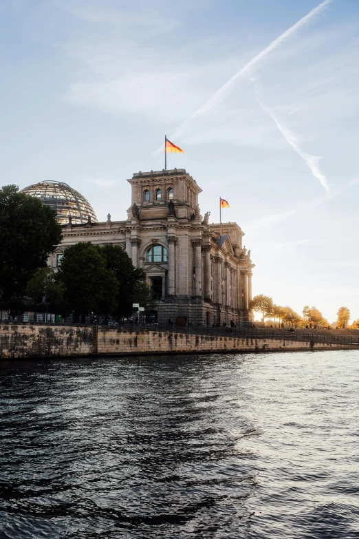 the side of a building is visible across water