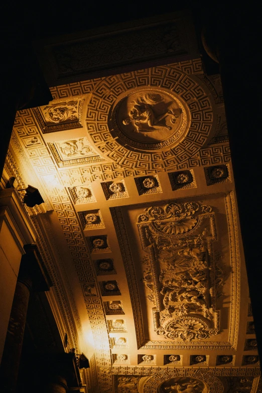 the ceiling of a very ornate building